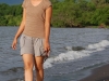 ometepe-chitra-walking-with-glasses-along-the-water